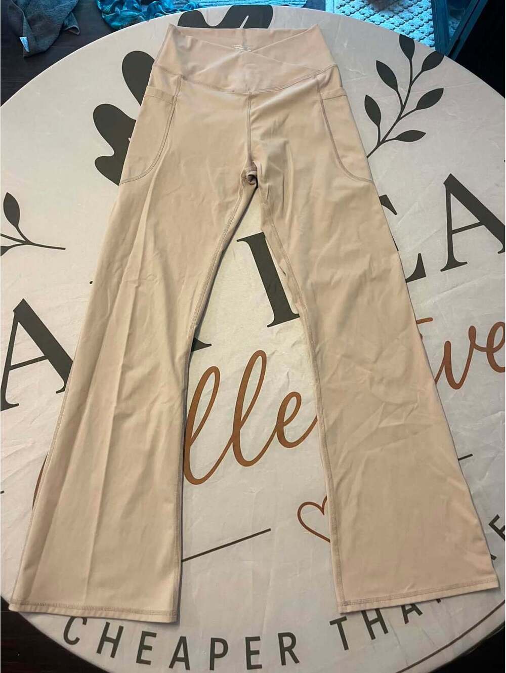 Beige High-Waisted Flared Yoga Pants with Side Pockets